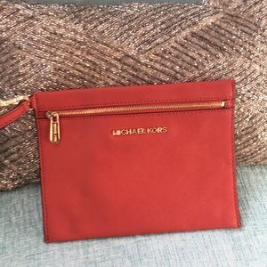 Brand new never used Michael kors clutch